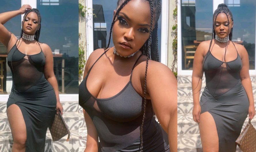 Curvy African Beauty Mesmerizes Fans by Flaunting Her Voluptuous Hips in a Stunning Black Gown Outdoors.(Video)