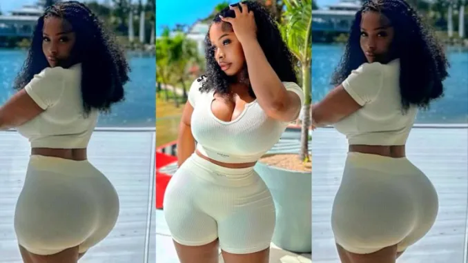 Behold the Enchanting Curves of a Stunning Ebony Beauty in White Shorts!